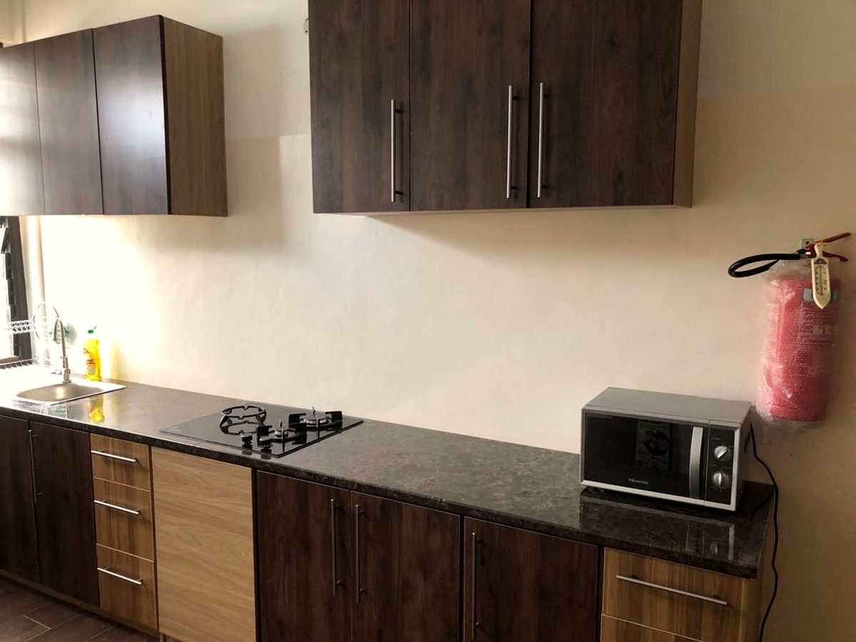 The shared kitchen of the apartment